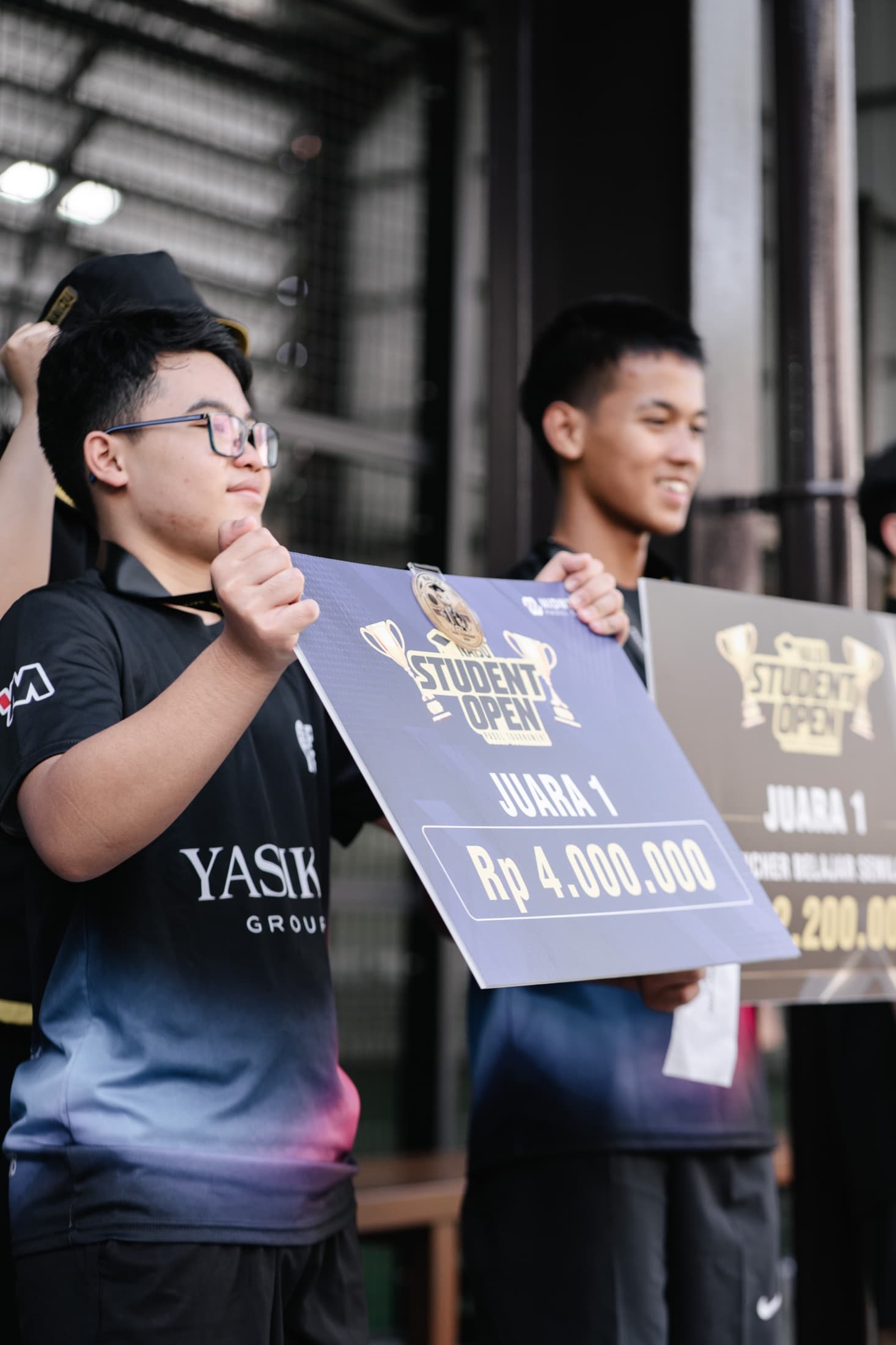 Naiju Student Open champions holding their winner boards